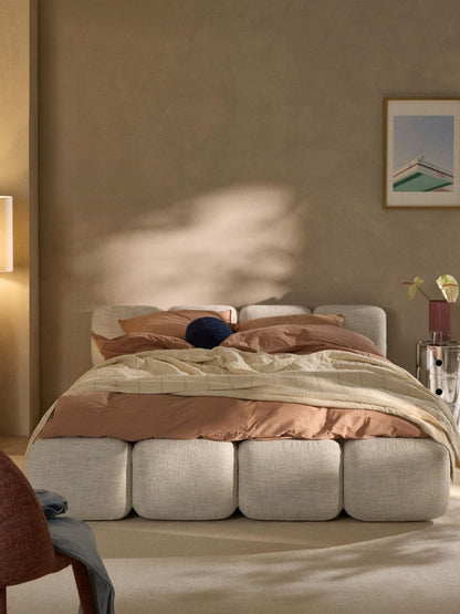 Taylin Upholstered Bed in Bouclé